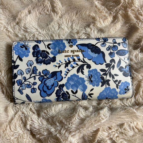 kate spade Handbags - SOLD!! Kate Spade Cream and Blue Floral Wallet